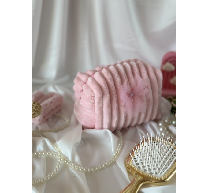 Small pink plush cosmetic bag with bows