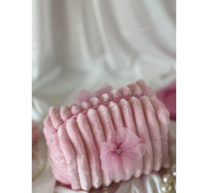 Small pink plush cosmetic bag with bows