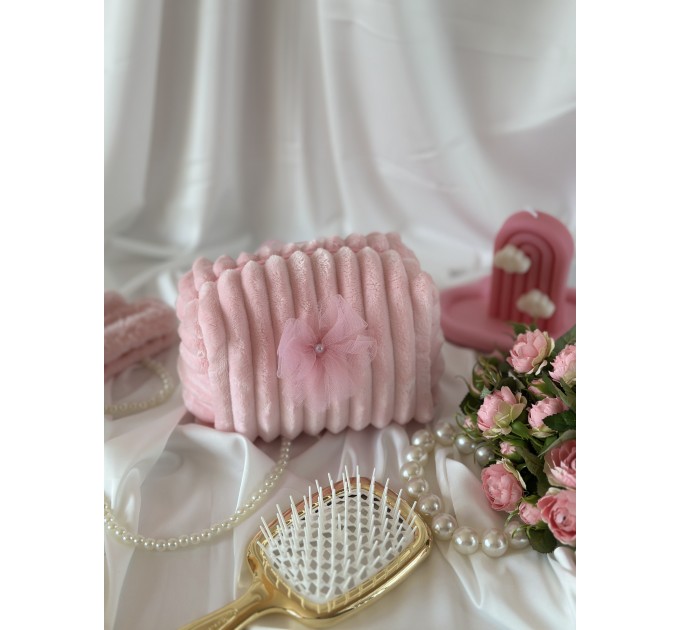 Small pink plush cosmetic bag with bows