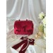 Small red velvet cosmetic bag with bows