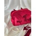 Small red velvet cosmetic bag with bows