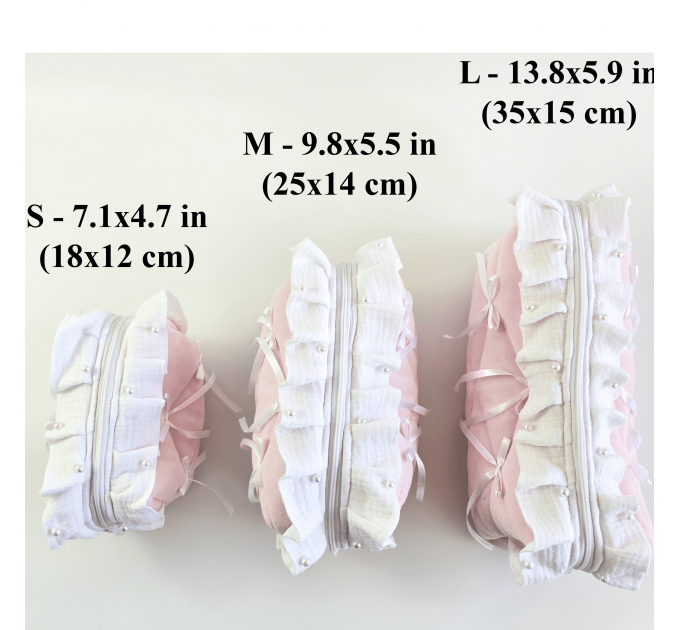 Small soft pink cosmetic bag with ruffles, bows and pearl-like beads