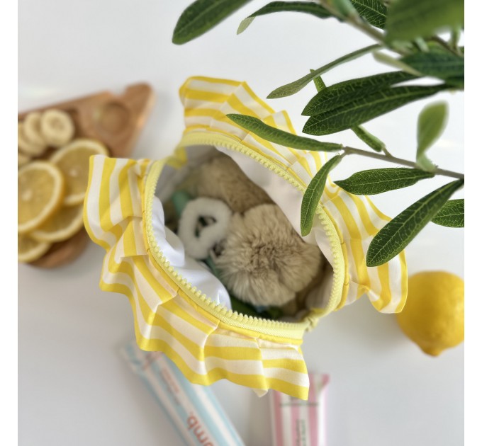 Small yellow striped cosmetic bag with ruffles