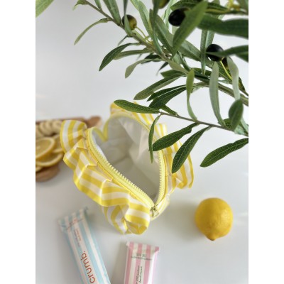 Small yellow striped ruffle cosmetic bag